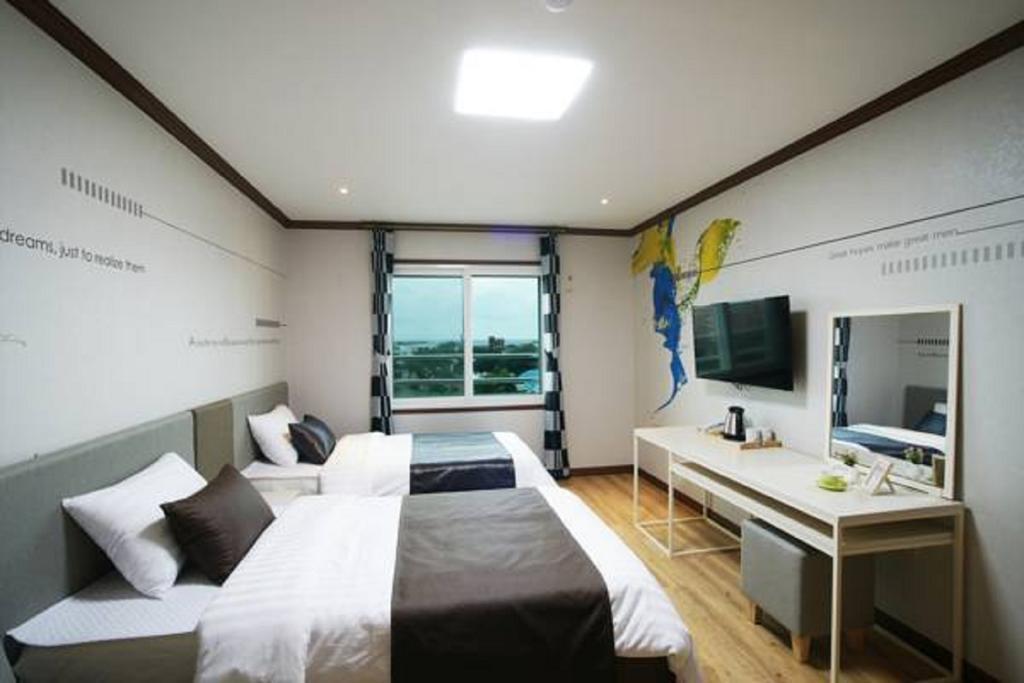 Seongsan Aqua Beach Hotel Seogwipo Cameră foto